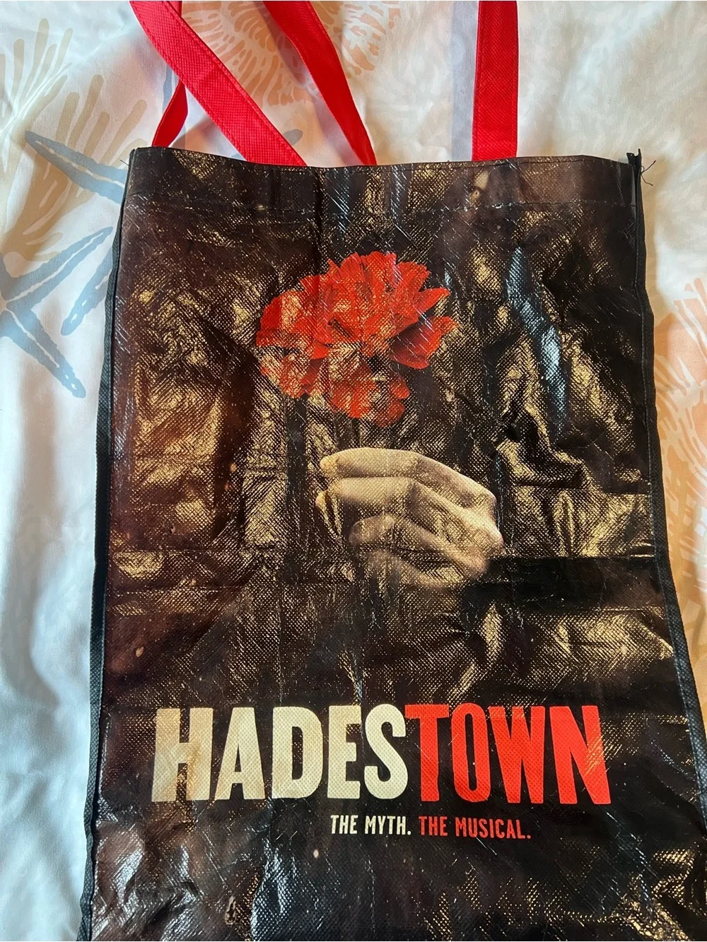 Hadestown Broadway Musical Reusable Tote Bag with Red Flower Graphic